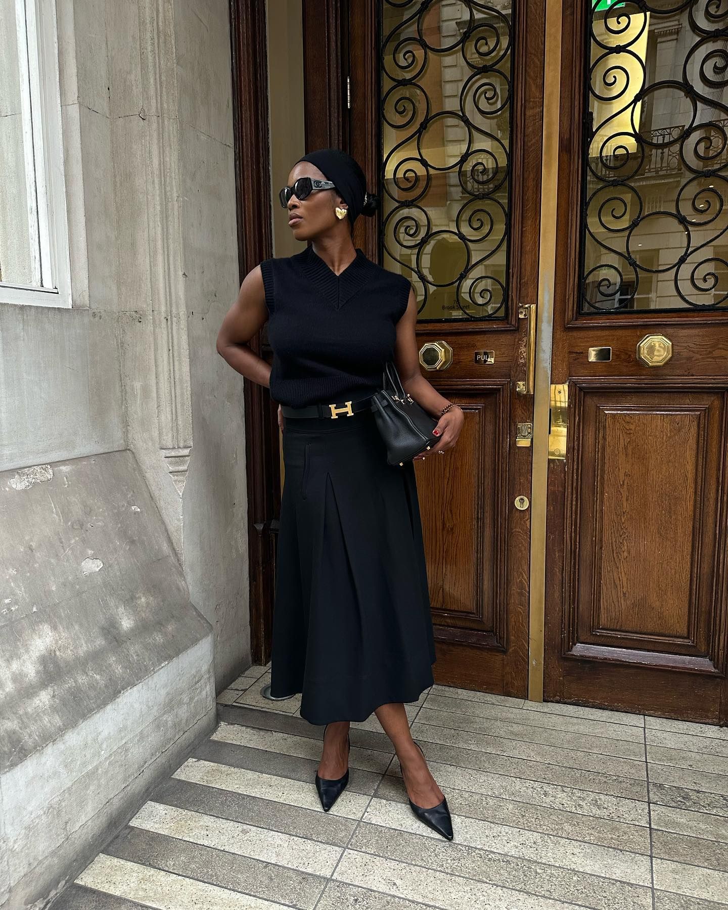 Woman wearing a summer skirt outfit.