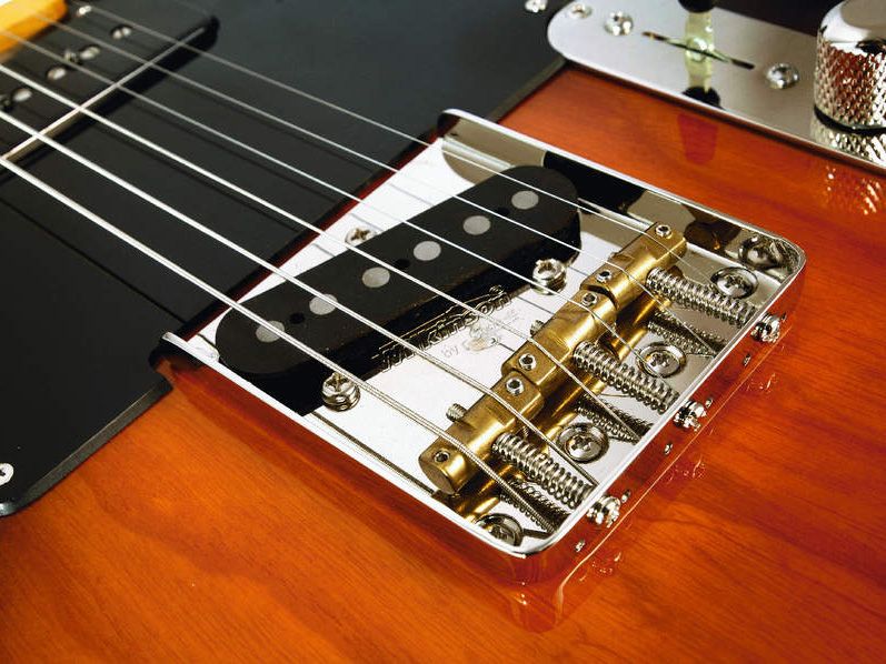 Note the Wilkinson bridge with brass saddles