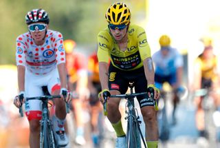 Team UAE Emirates rider Slovenias Tadej Pogacar wearing the best climbers polka dot jersey L and Team Jumbo rider Slovenias Primoz Roglic wearing the overall leaders yellow jersey cross the finish line at the end of the 18th stage of the 107th edition of the Tour de France cycling race 168 km between Meribel and La Roche sur Foron on September 17 2020 Photo by STEPHANE MAHE POOL AFP Photo by STEPHANE MAHEPOOLAFP via Getty Images