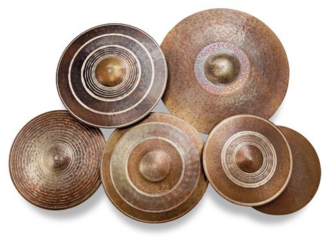 Each cymbal has a different degree of sparse hammerings, all done by hand.