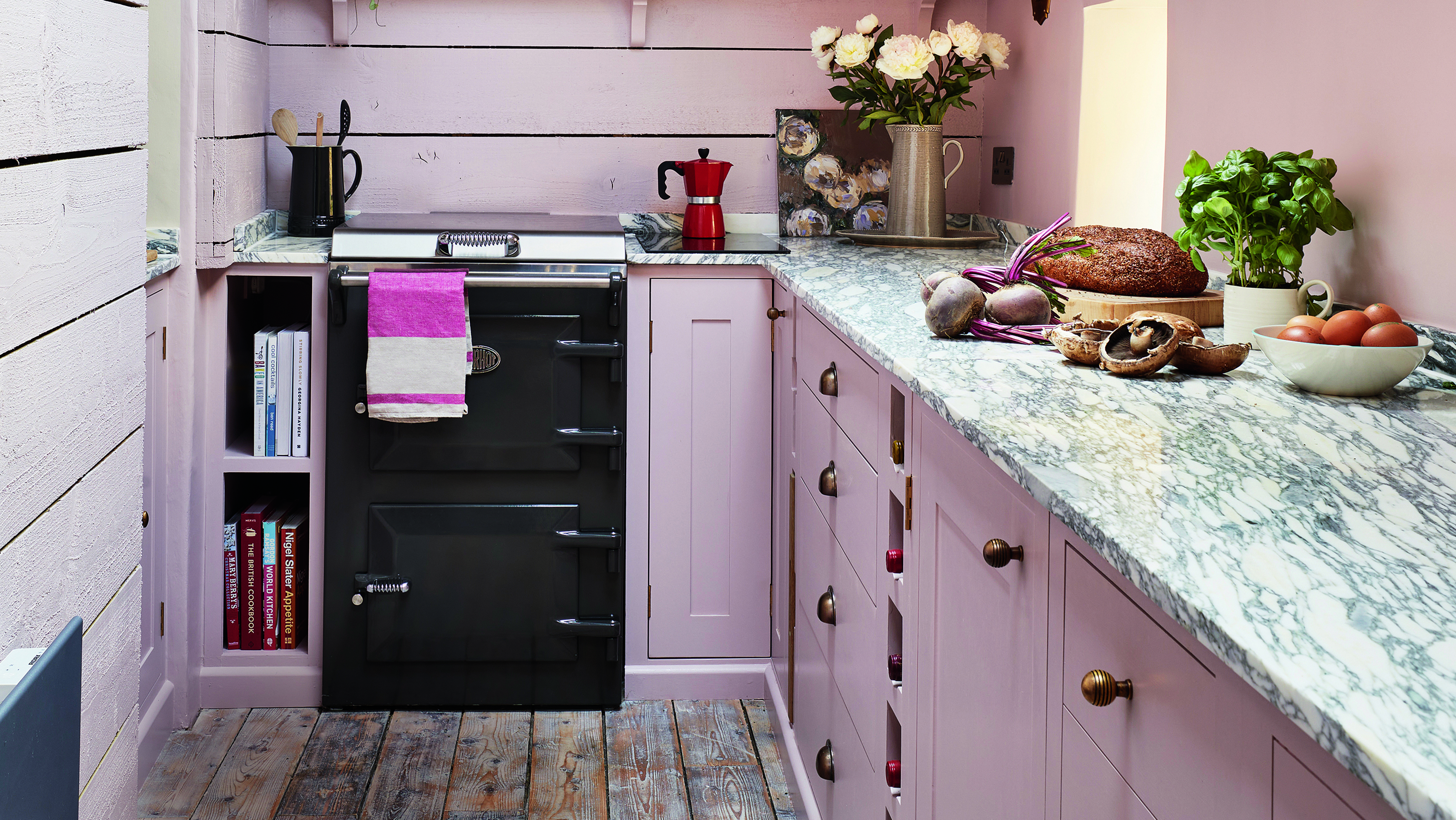 Pink shaker kitchen in cottage
