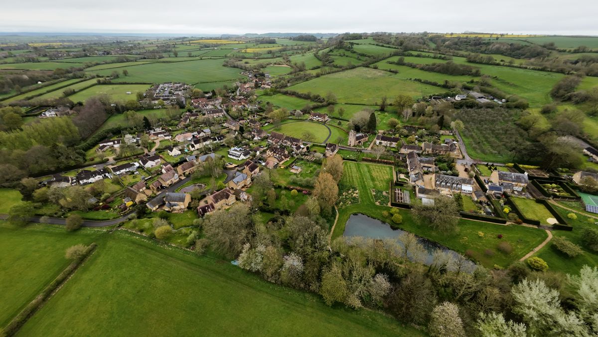 Aerial images of rural UK village and fields on an overcast day taken with the DJI Avata 2