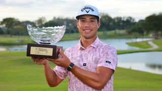 Isaiah Salinda with the trophy after his win at the Panama Championship