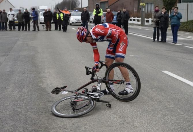 Thor Hushovd (BMC Racing Team) picks up his bike after a crash