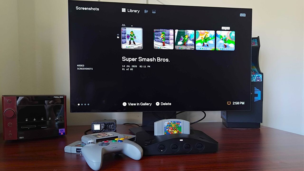 Analogue 3D plugged into monitor with library screenshots of Super Smash Bros displayed.