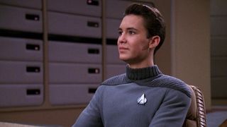 Image of a young Wesley Crusher in a gray Starfleet Uniform.