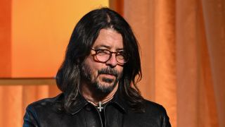 Dave Grohl looking down at 2023 Special Merit Awards Ceremony