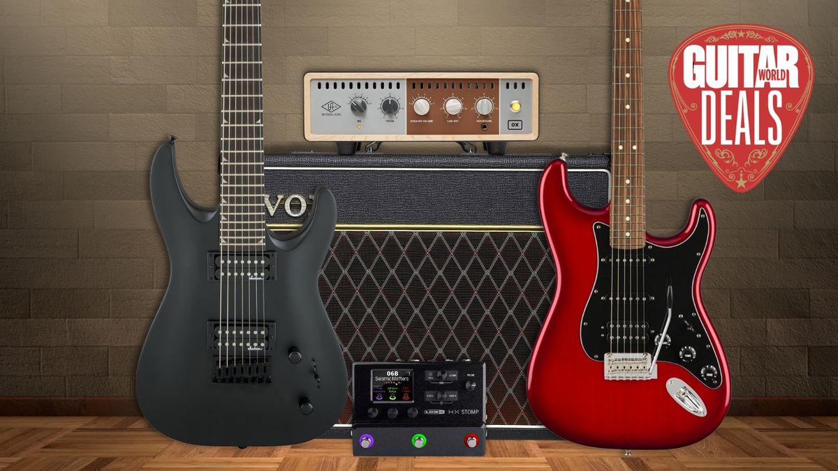 A Fender Strat and Jackson 7-string guitar leaning against a Vox amp with a Line 6 HX Stomp in between.