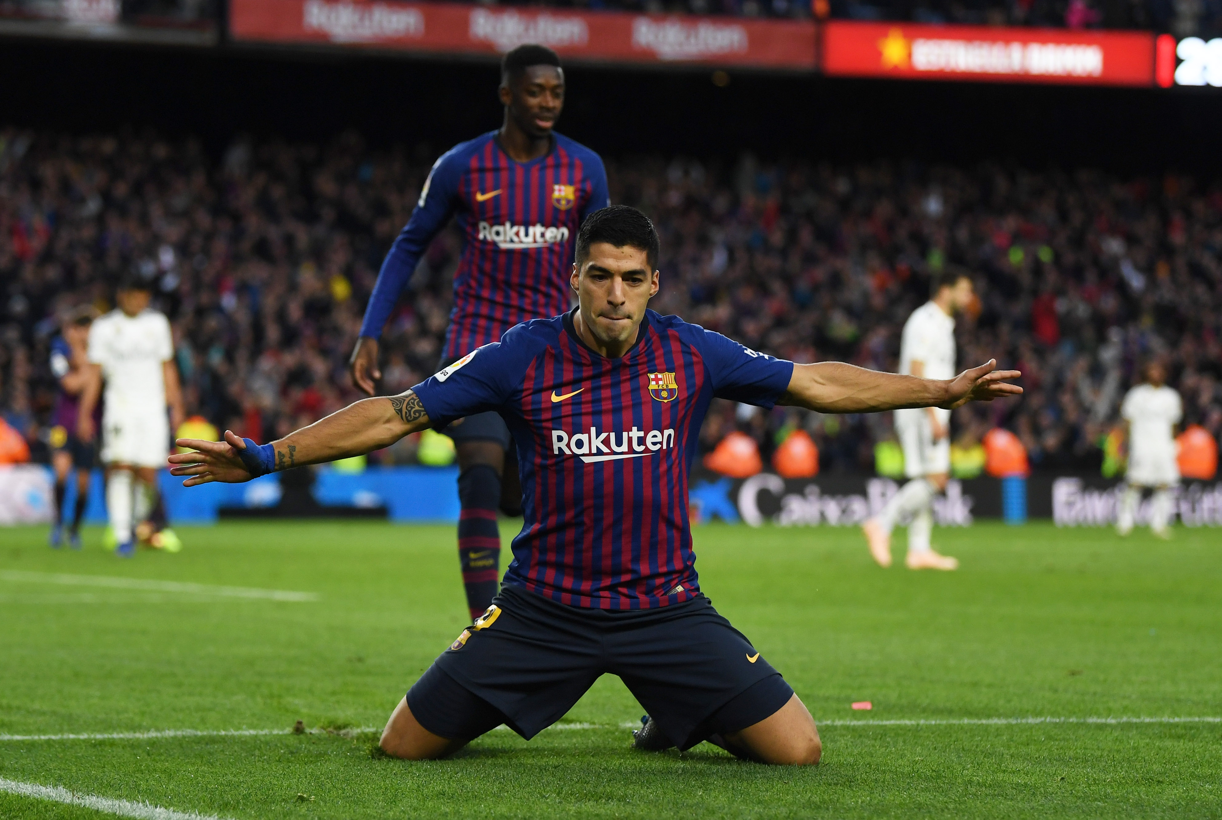 Luis Suarez celebrates after scoring for Barcelona against Real Madrid in a 5-1 win at Camp Nou in October 2018.