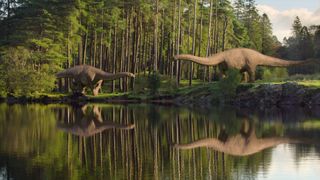 Two long-necked dinos on the riverbank in Life On Our Planet