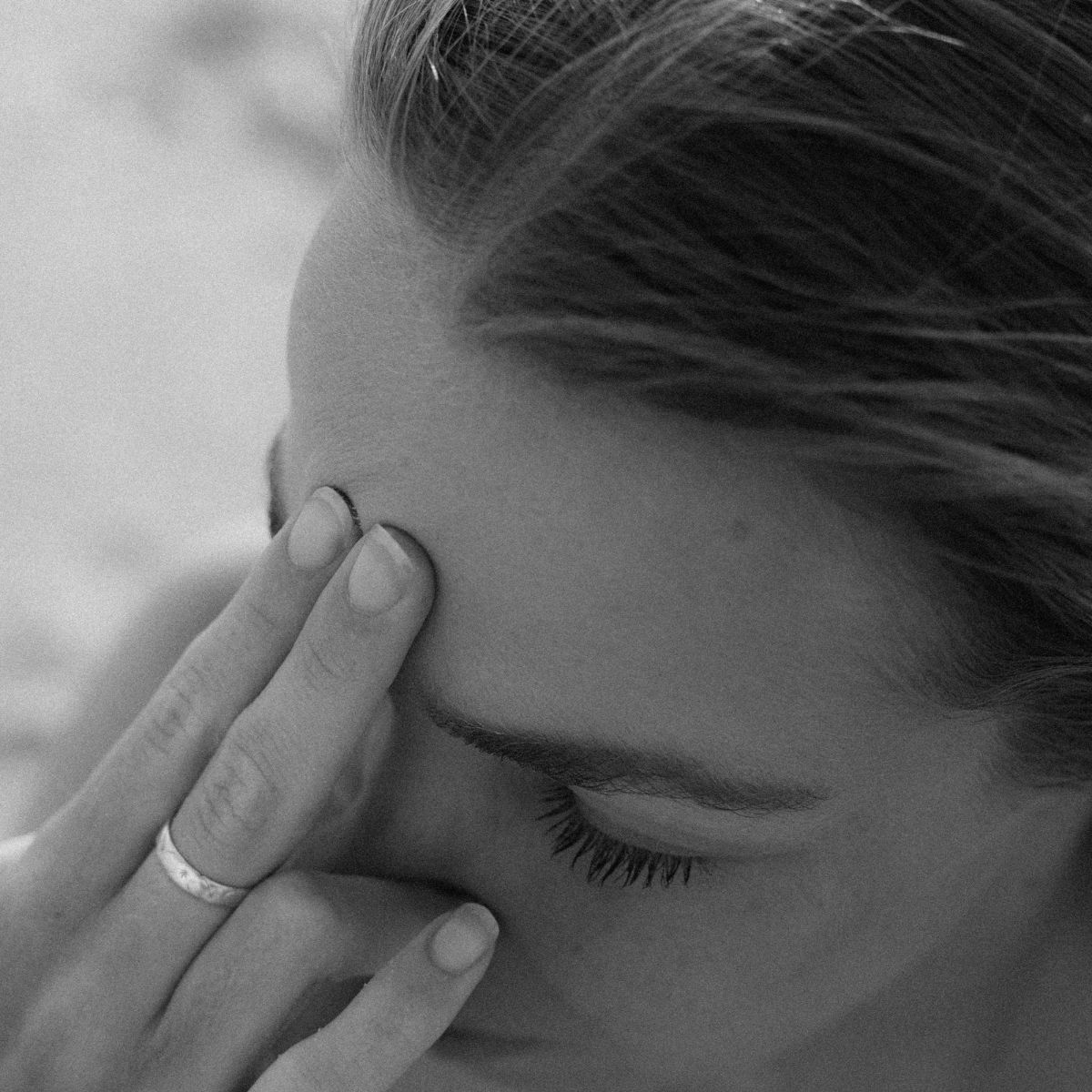 A woman tapping her head with two fingers; two nature images.