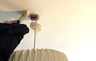 painting a ceiling around a light fixture