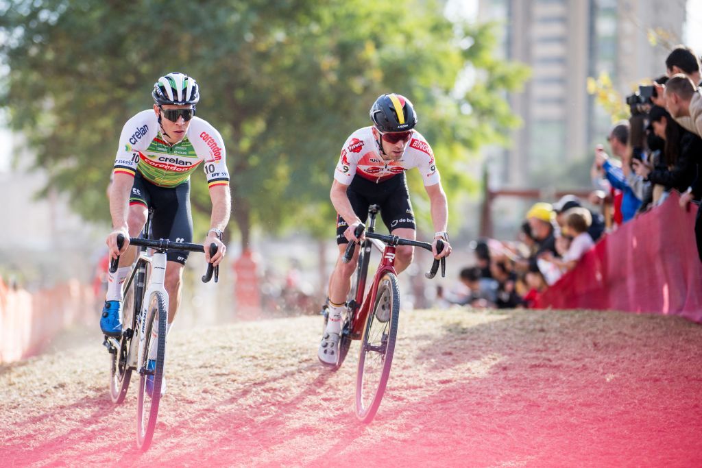 Belgian Laurens Sweeck and Belgian Eli Iserbyt pictured in action during the men's elite race at the cyclocross cycling event in Benidorm, Spain, Sunday 21 January 2024, stage 13/14 in the World Cup ranking. BELGA PHOTO JASPER JACOBS (Photo by JASPER JACOBS / BELGA MAG / Belga via AFP)