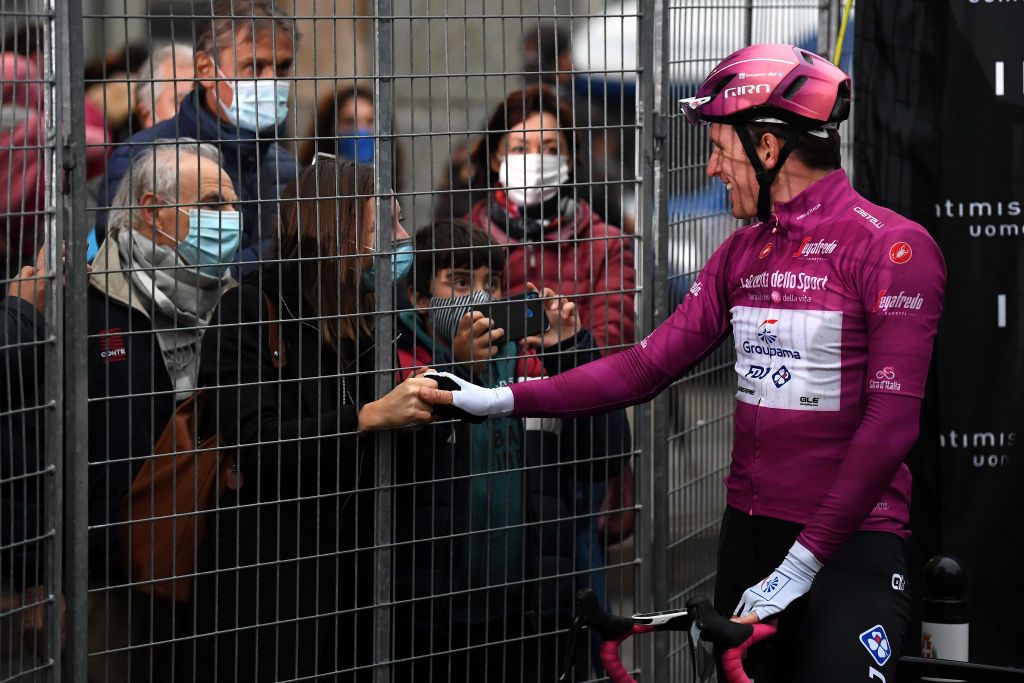 ASTI ITALY OCTOBER 23 Arrival Arnaud Demare of France and Groupama FDJ Purple Points Jersey and his Wife Morgane Demare Celebration during the 103rd Giro dItalia 2020 Stage 19 a 1245km stage from Abbiategrasso to Asti Stage shortened due to heavy rain girodiitalia Giro on October 23 2020 in Asti Italy Photo by Tim de WaeleGetty Images