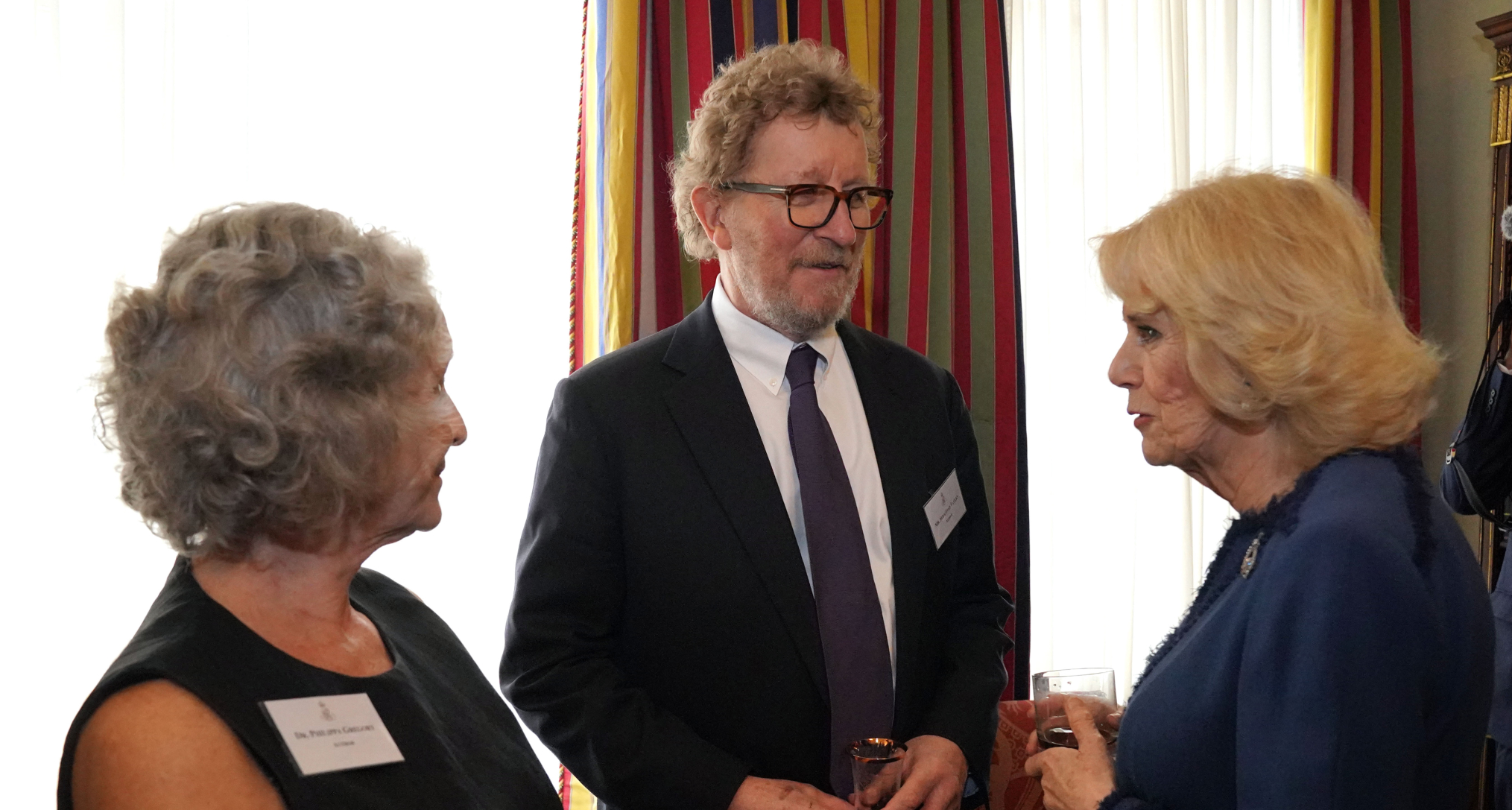 Queen Camilla talking to authors Philippa Gregory and Sebastian Faulks 