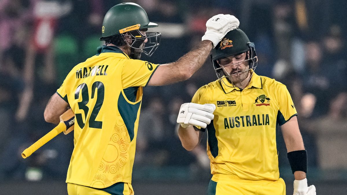 Australia&#039;s Josh Inglis and Glenn Maxwell celebrate after winning the ICC Champions Trophy ODI cricket match between Australia and England