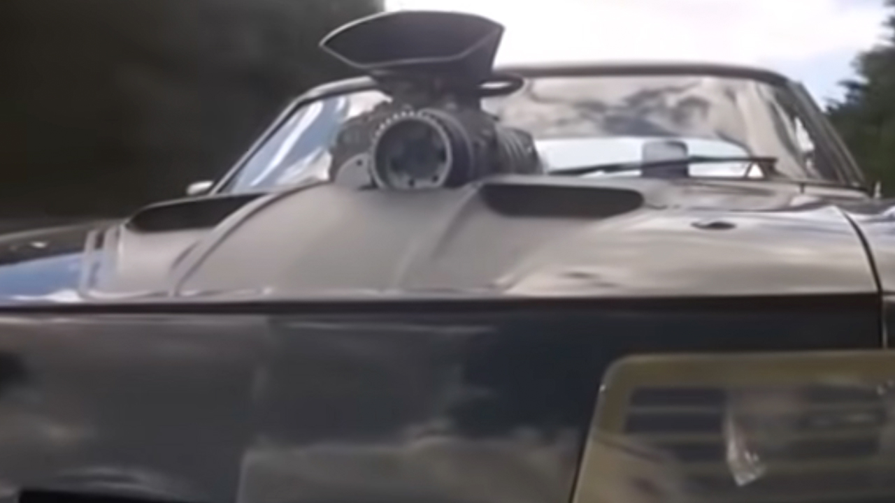 A close up of a Ford Falcon from the front in Mad Max