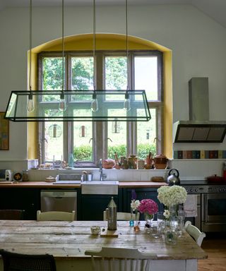 kitchen with yellow painted window reveals