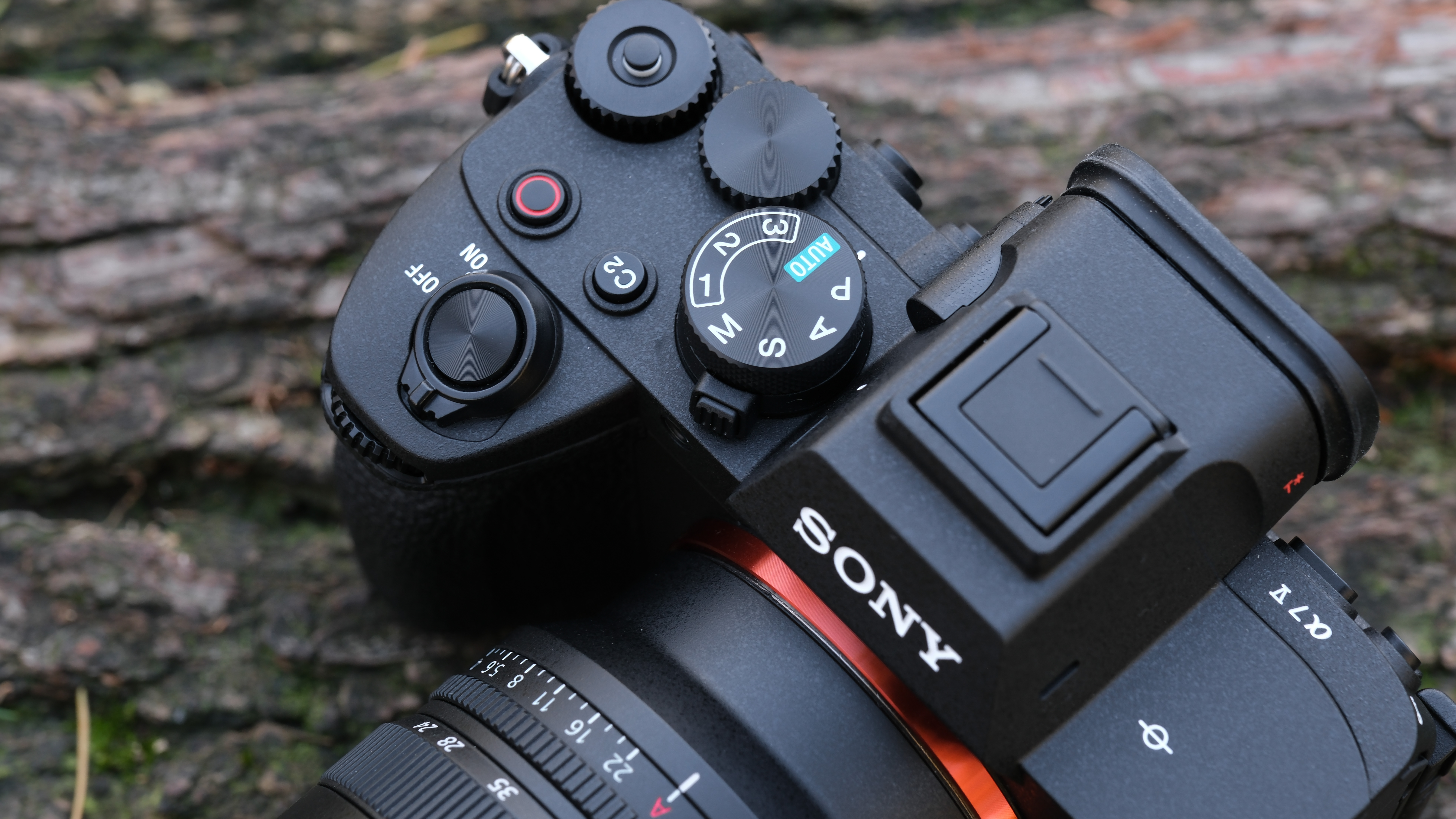Close up of the control dials on a Sony A7 V camera