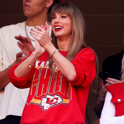 KANSAS CITY, MISSOURI - OCTOBER 22: Taylor Swift and Brittany Mahomes react during a game between the Los Angeles Chargers and Kansas City Chiefs at GEHA Field at Arrowhead Stadium on October 22, 2023 in Kansas City, Missouri. (Photo by Jamie Squire/Getty Images)
