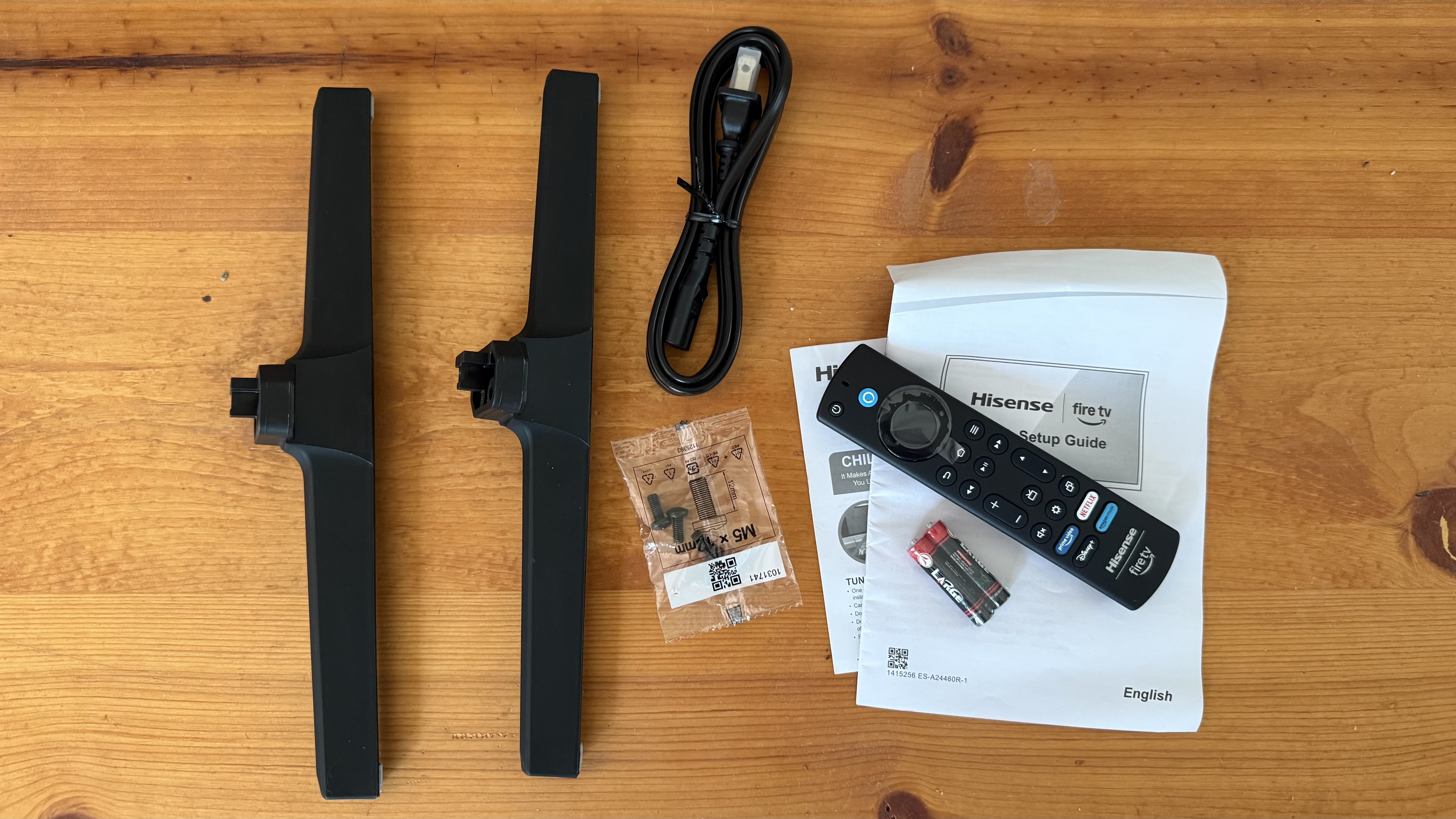 Hisense U65QF included accessories on table