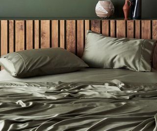 Ettitude Signature Sateen Sheets on a bed.