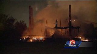 the LeBeau Plantation house on fire near New Orleans