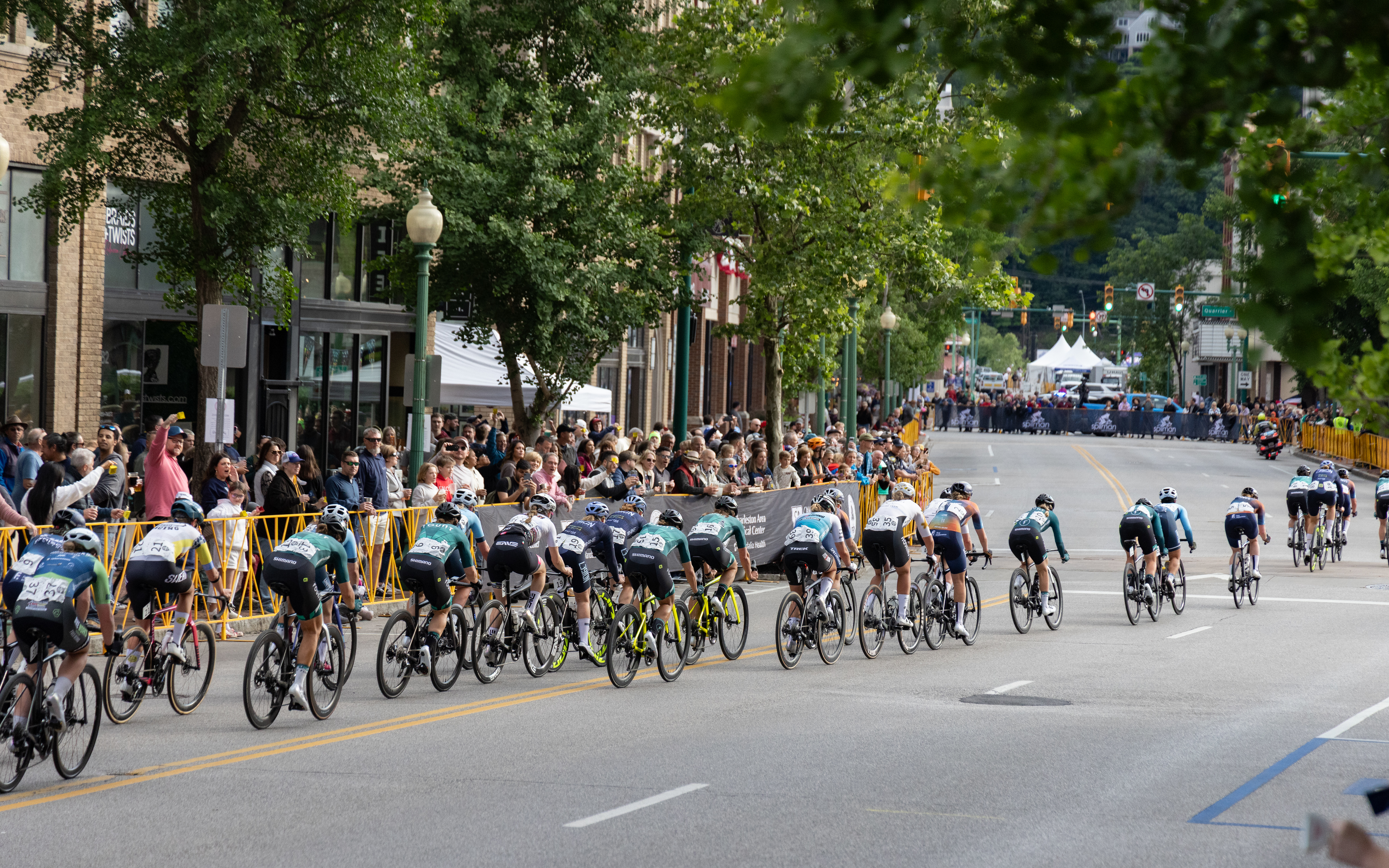 The women's elite criterium field wound through a crowded section of downtown lined with shops and restarurants.