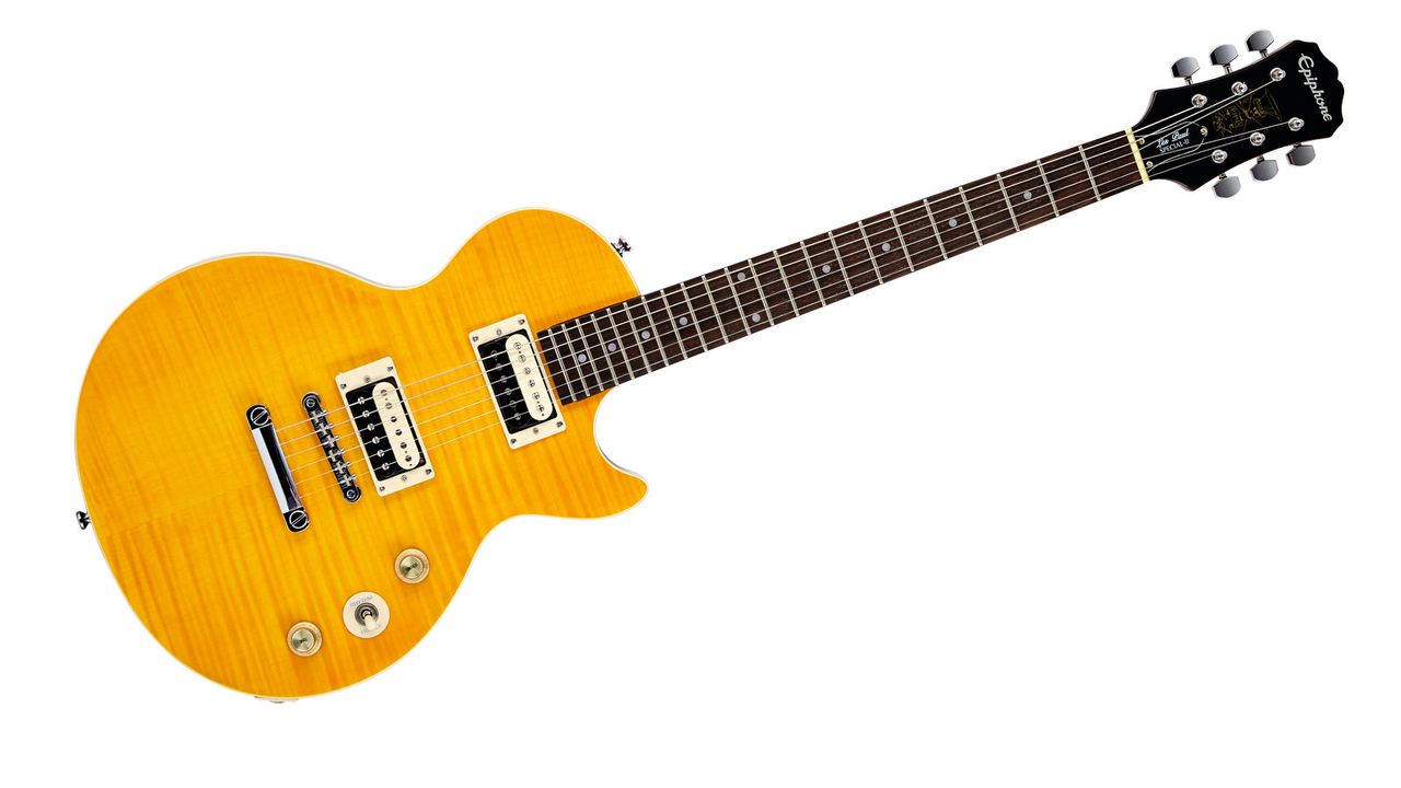 The mahogany body, resplendent in a flamed maple veneer finished in Appetite Amber, is thinner than on a Gibson LP