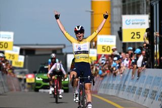 Demi Vollering celebrates winning the Tour de Suisse 2024