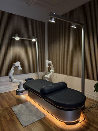 A lit AI-powered massage table at Equinox spa in New York.