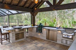 outdoor kitchen ideas: covered space designed by Pratt Guys