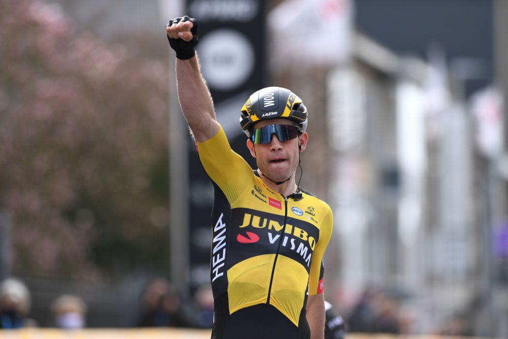 WEVELGEM BELGIUM MARCH 28 Arrival Wout Van Aert of Belgium and Team Jumbo Visma Celebration during the 83rd GentWevelgem in Flanders Fields 2021 Mens Elite a 254km race from Ypres to Wevelgem GWE21 GWEmen FlandersClassic on March 28 2021 in Wevelgem Belgium Photo by Tim de WaeleGetty Images
