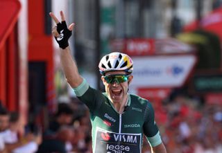 Team Visma's Wout van Aert celebrates crossing first the finish line in Baiona on August 27, 2024, at the end of the stage 10 of La Vuelta a Espana cycling tour, a 160 km race between Ponteareas and Baiona. (Photo by MIGUEL RIOPA / AFP) (Photo by MIGUEL RIOPA/AFP via Getty Images)