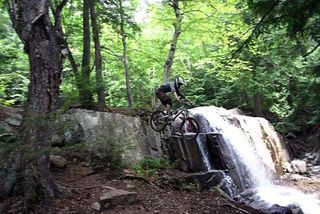 A rider at the Whiteface Mountain Bike Park