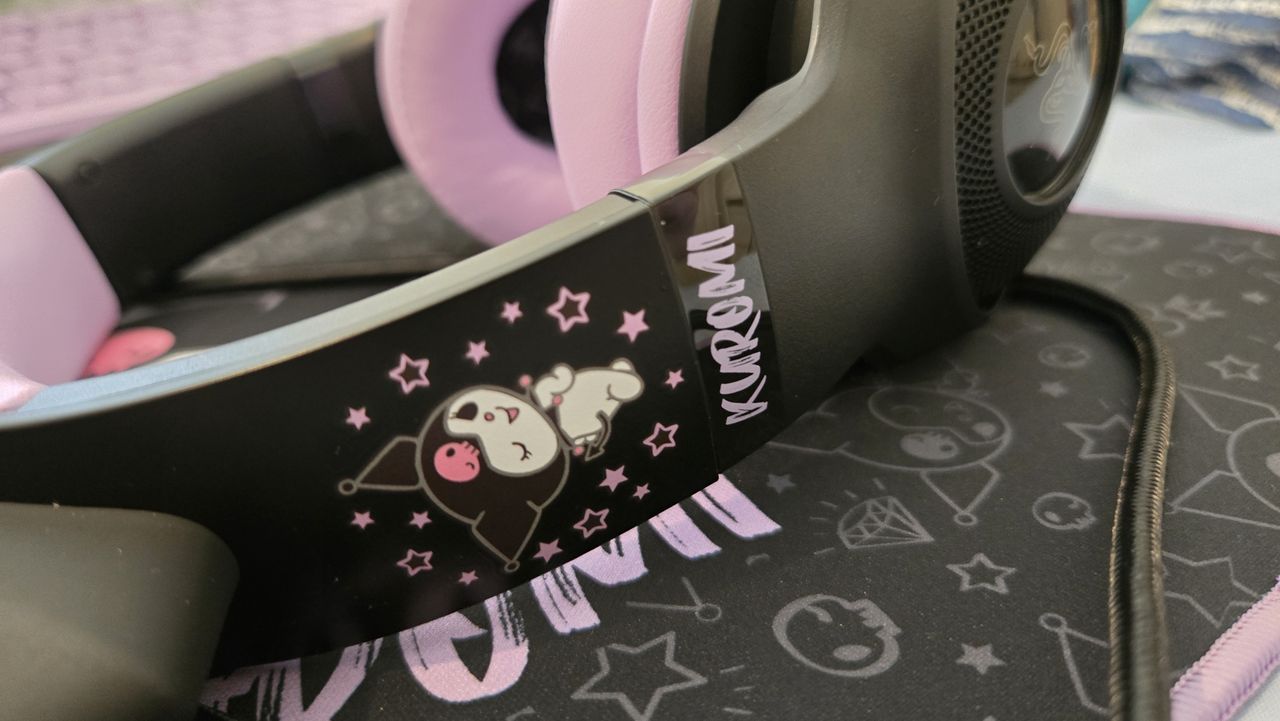 Razer | Kuromi collection peripherals laid out on a desk.