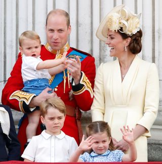 Prince William, Duke of Cambridge, Catherine, Duchess of Cambridge, Prince Louis of Cambridge, Prince George of Cambridge and Princess Charlotte of Cambridge stand on the balcony of Buckingham Palace