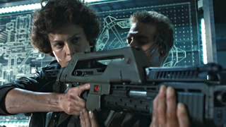 Ellen Ripley with a weapon in Aliens