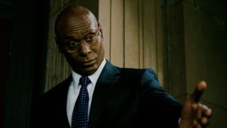 Lance Reddick welcoming a guest into The Continental in John Wick: Chapter 3 - Parabellum.