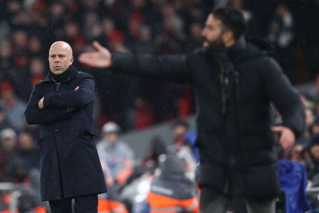 Liverpool manager Arne Slot (L) and Manchester United head coach Ruben Amorim (R) look on during the English Premier League football match between Liverpool and Manchester United at Anfield in Liverpool, north west England on January 5, 2025.