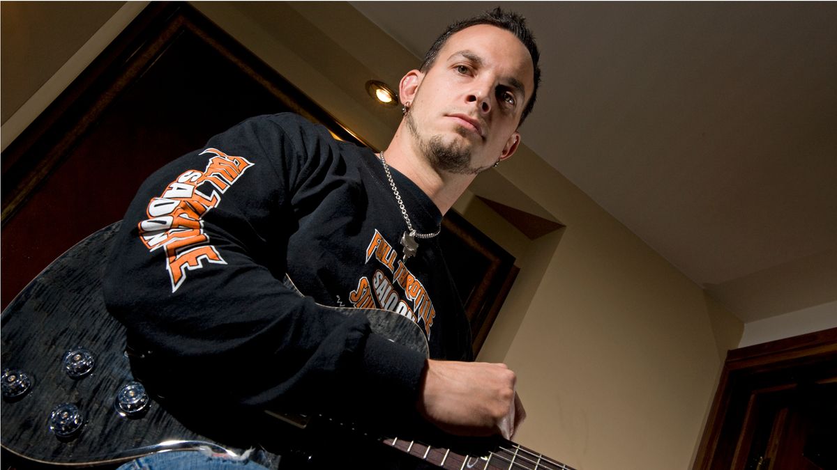 Mark Tremonti poses with guitar