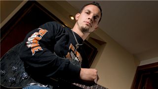 Mark Tremonti poses with guitar