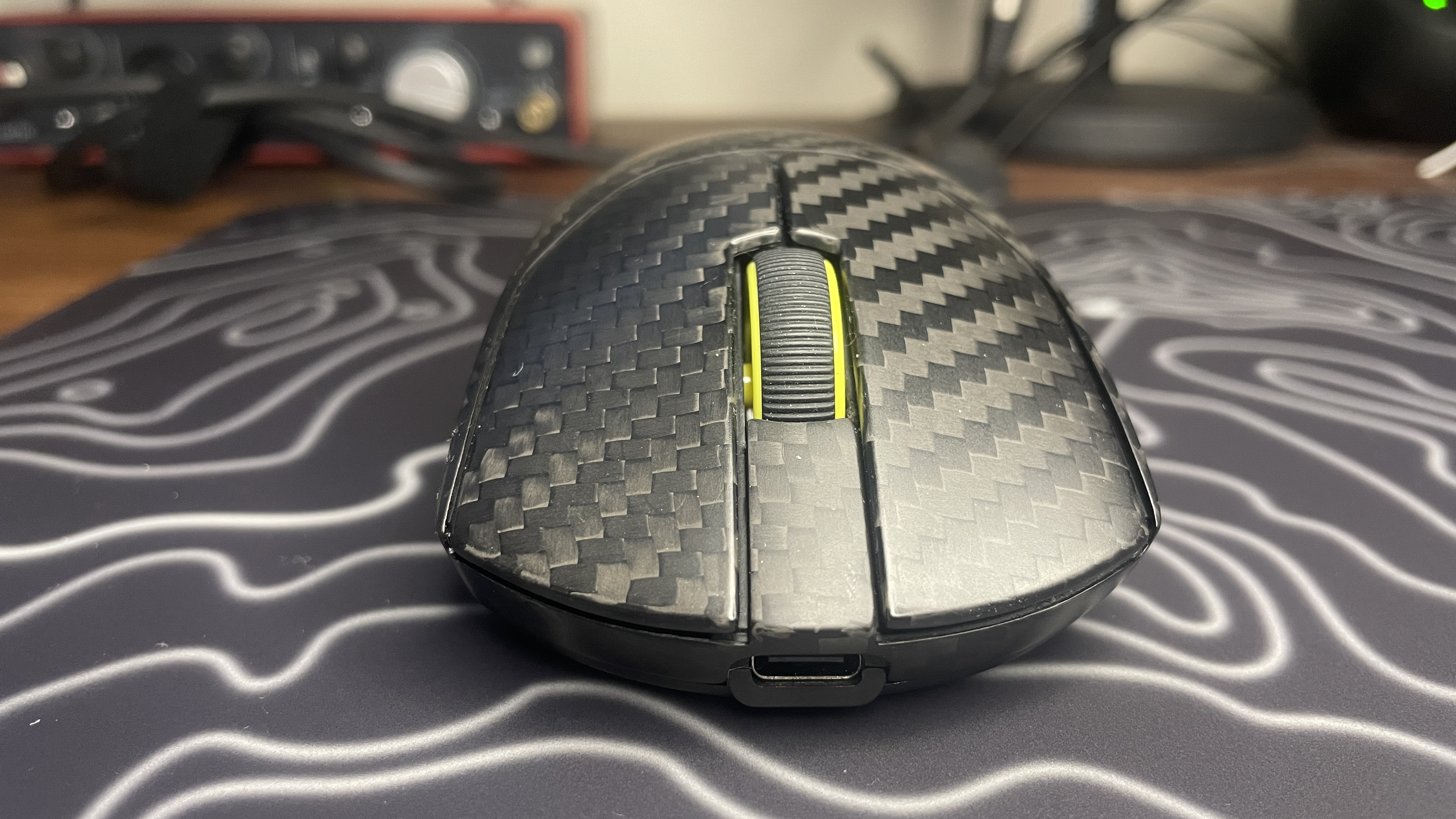A Corsair Sabre V2 Pro Wireless CF gaming mouse.