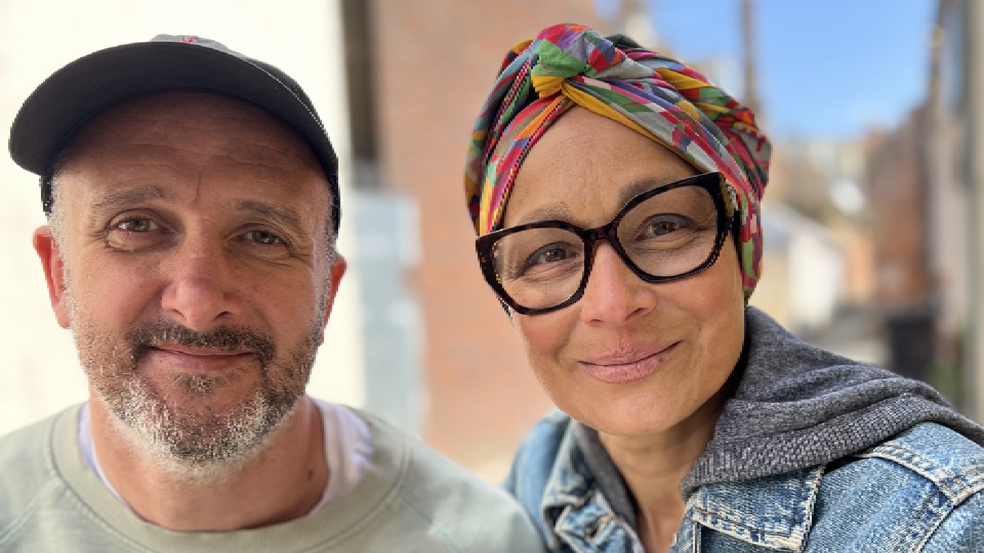 Zelda Burborough, wearing a headwrap, and her husband