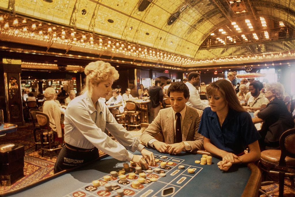 A couple playing roulette at the Tropicana Las Vegas hotel and casino in Las Vegas, Nevada