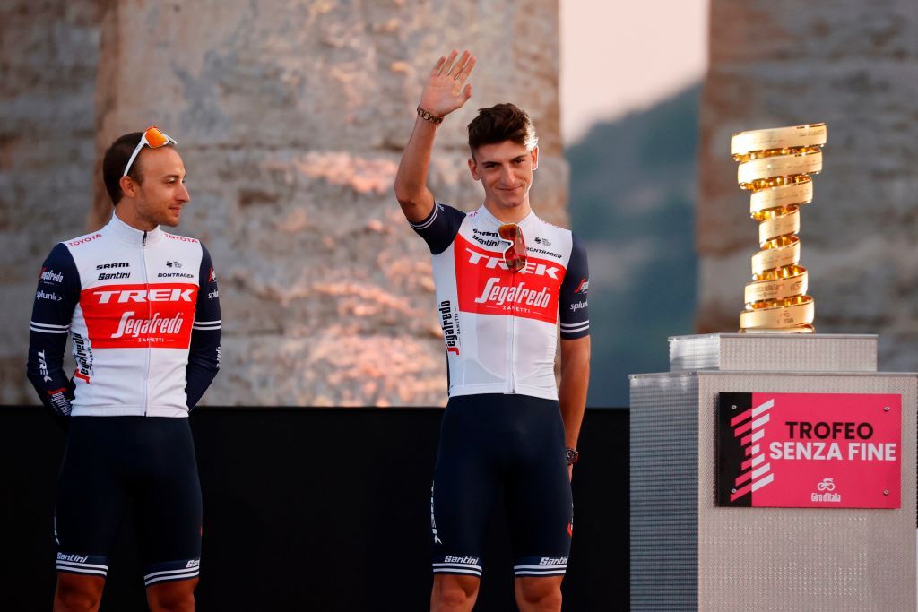 Team Trek rider Italys Giulio Ciccone C waves on stage at the Doric Temple of Segesta near Palermo Sicily on October 1 2020 during an opening ceremony of presentation of participating teams and riders two days ahead of the departure of the Giro dItalia 2020 cycling race Photo by Luca Bettini AFP Photo by LUCA BETTINIAFP via Getty Images