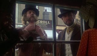 The Great Train Robbery Donald Sutherland and Sean Connery looking through a shop window
