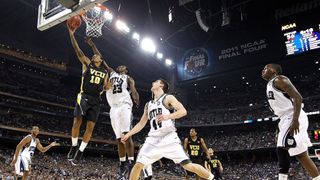 VCU Rams' Darius Theus goes to the hoop against Butler |Bulldogs' Khyle Marshall and Andrew Smith during the Final Four of March Madness 2011