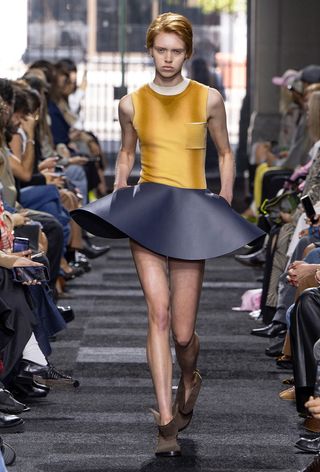 a model on the JW Anderson spring 2025 runway wearing the voluminous skirt trend