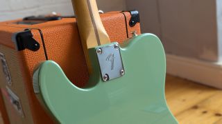 The back of the body of a Fender Telecaster Player II, showing detail of the neck plate